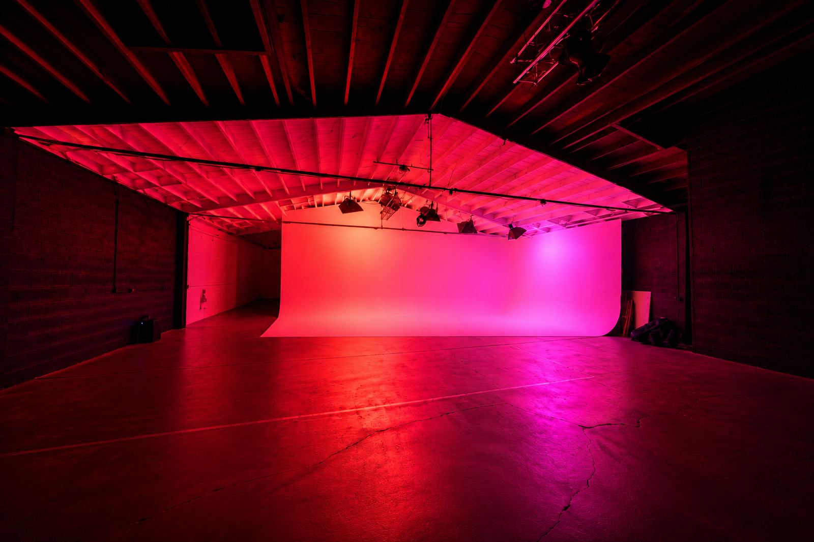 Cyclorama washed in red from the RGBW grid